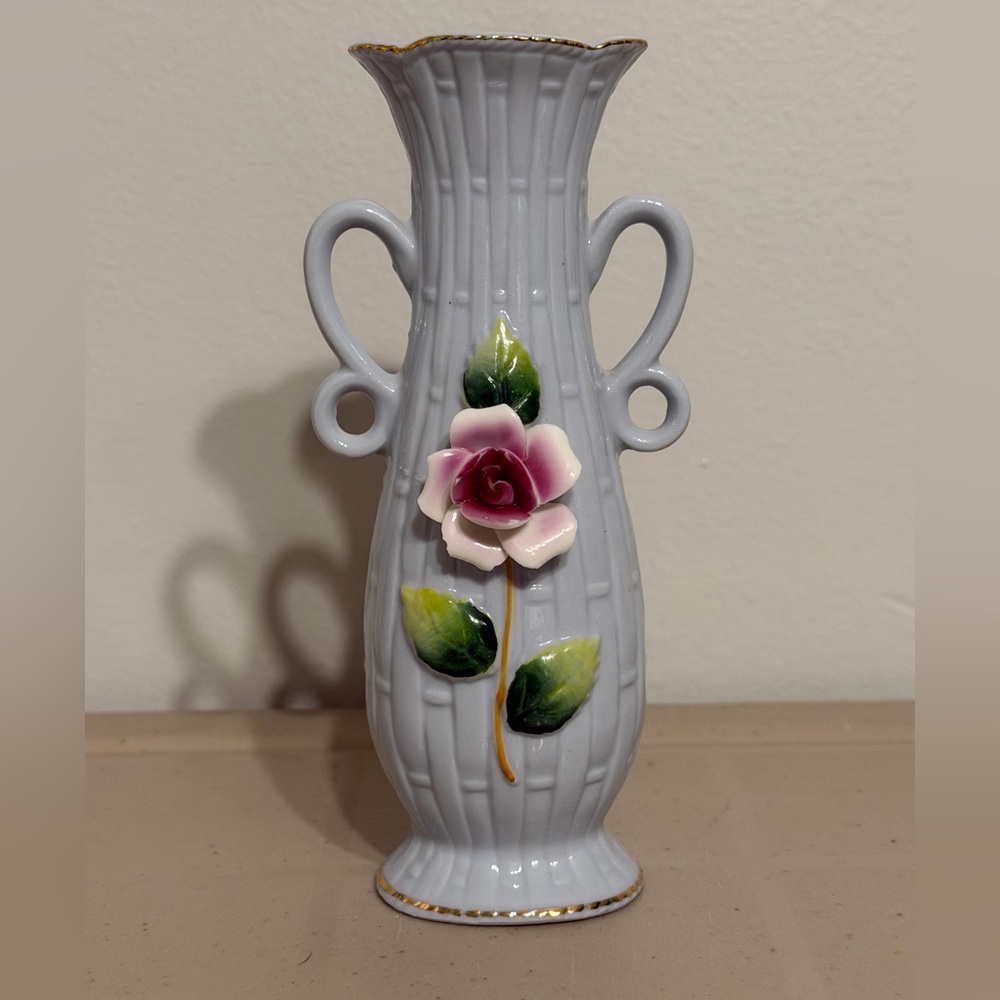 Small Vintage Ceramic Vase With Intricate Design.